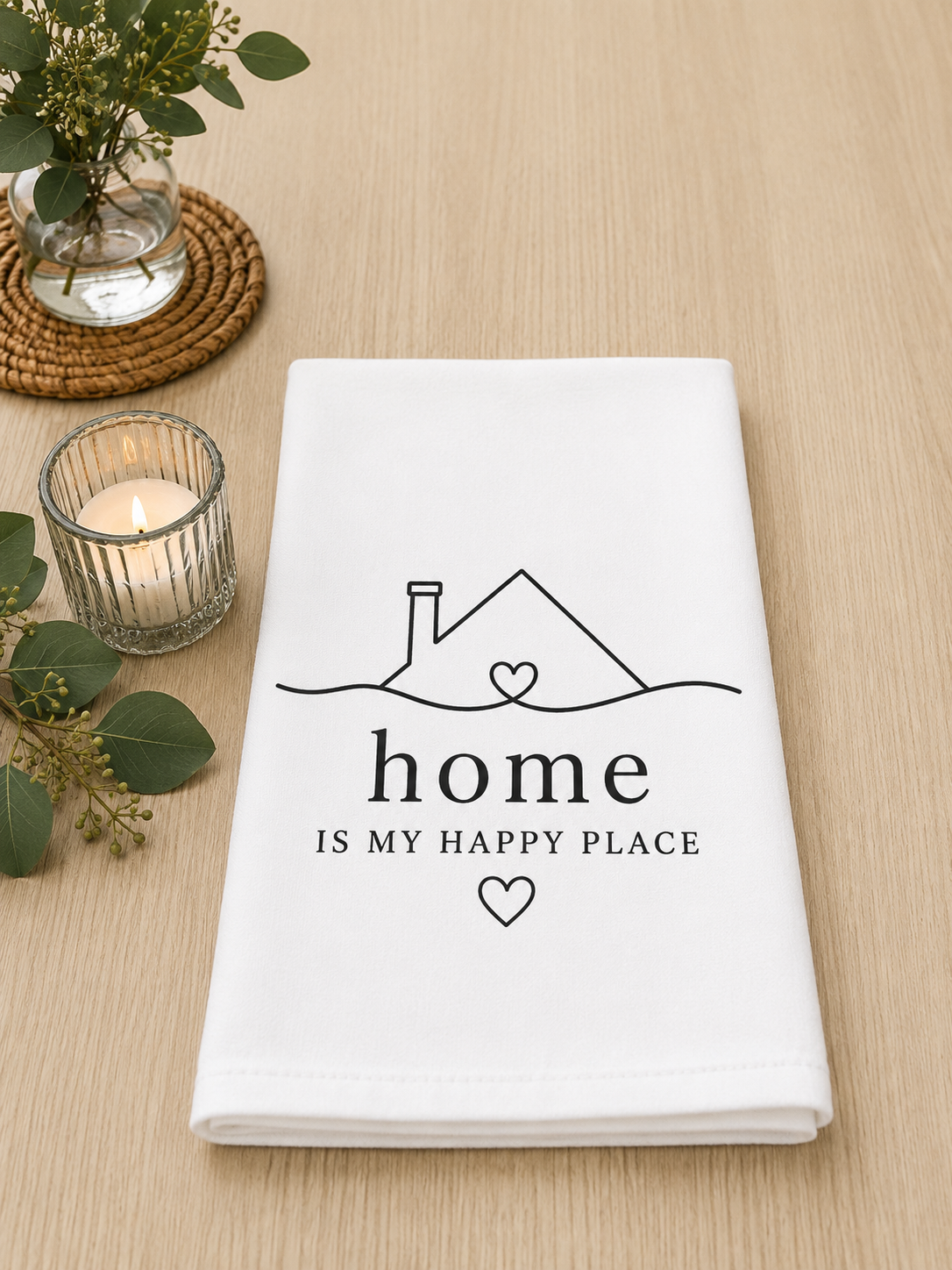 Tea towel with minimalist house line drawing and the saying home is my happy place